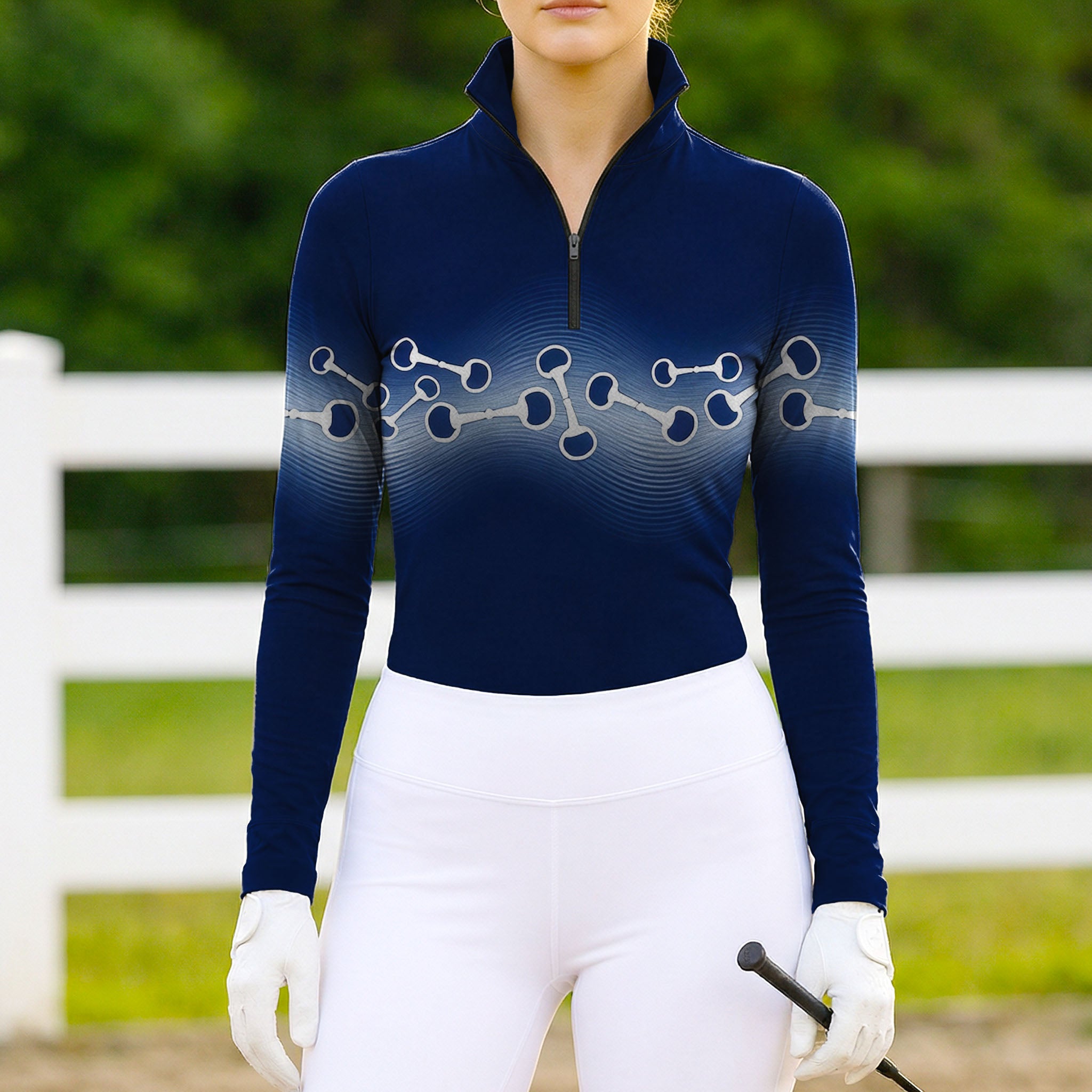 Woman wearing RIDER ATELIER wave snaffle bit quarter-zip top at the outdoor pasture
