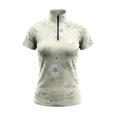 White background studio shot of soft sage white floral ghost horse print short sleeve quarter zip riding top