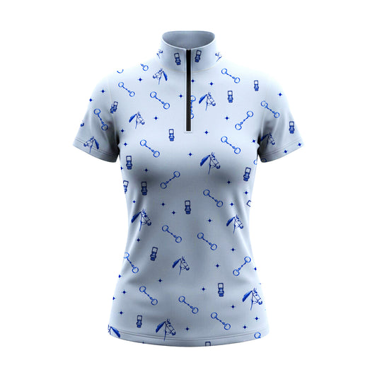 White background studio shot of allover blue line art horse tack short sleeve quarter zip riding top