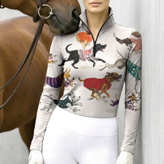 Model standing beside a chestnut horse against light grey stable wall wearing off-white dog sweater long sleeve riding top