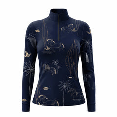 Close-up of model wearing navy whimsical horse riding top against a textured wall