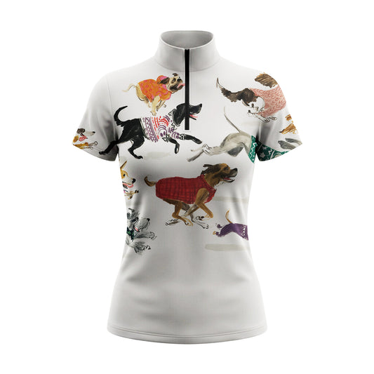 Side model shot leaning on white wooden pasture fence wearing off-white dog lover knit sweater puppy short sleeve riding top in sunlit green grass field

