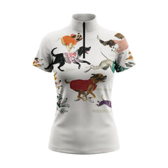 Side model shot leaning on white wooden pasture fence wearing off-white dog lover knit sweater puppy short sleeve riding top in sunlit green grass field
