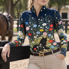 Model in the navy floral foal print riding top with light breeches by equestrian fencing