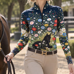 Close view of the dotted border at the hem of the navy floral foal print riding top