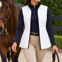 Solid white reverse side of the reversible quilted equestrian vest with diamond quilted stitching and standing collar