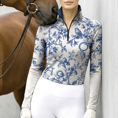 Worn view of the printed long sleeve quarter zip riding top alongside a horse in an equestrian setting