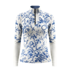 Off white long sleeve quarter zip riding top with a blue floral and equestrian tack print, standing collar and black center front zipper
