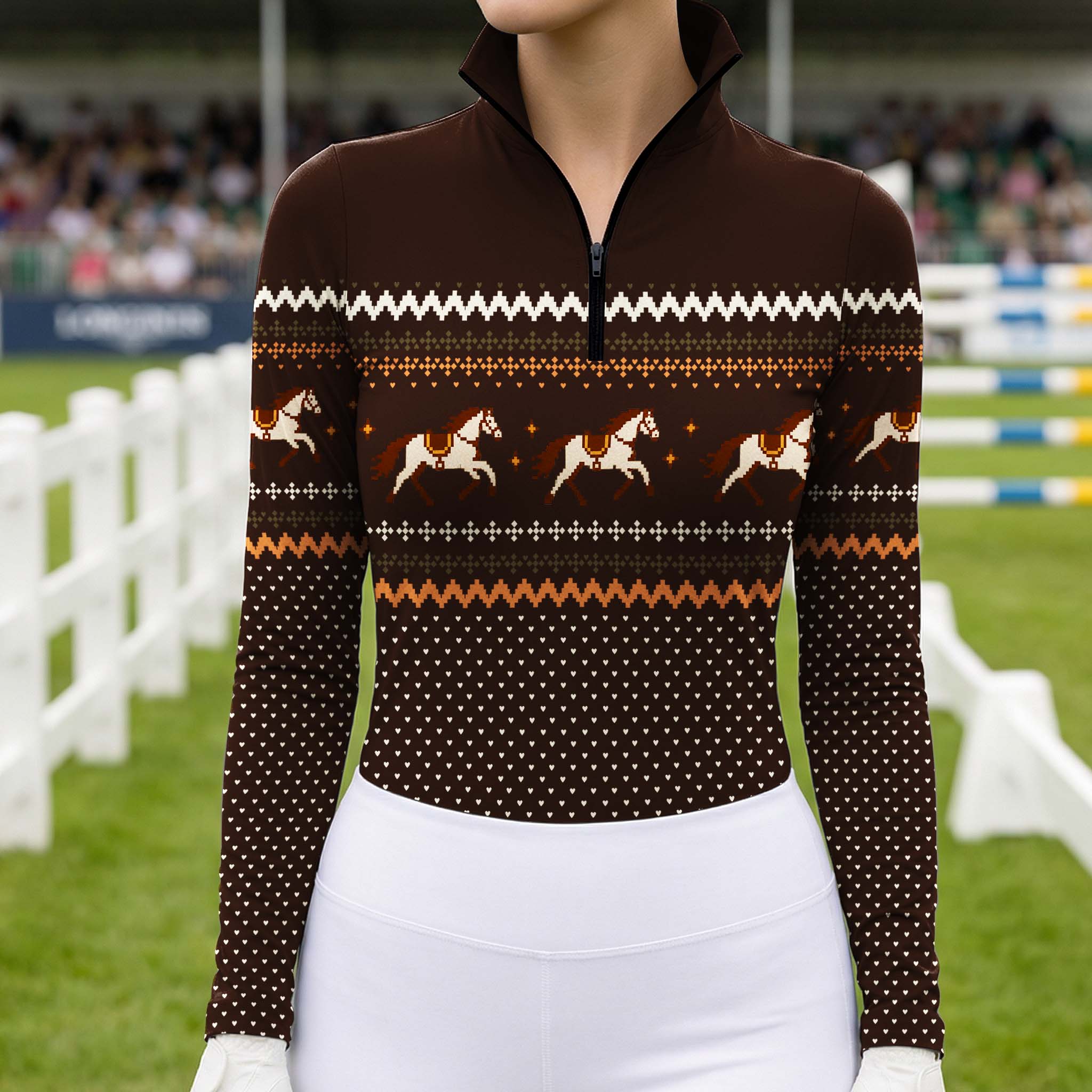 Close up front view of the riding top worn by a rider in an equestrian arena