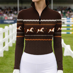 Close up front view of the riding top worn by a rider in an equestrian arena