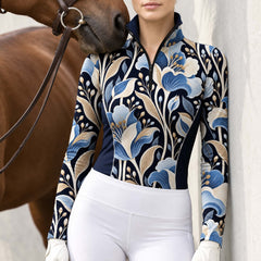 Close view of the dark navy floral print, black quarter zip and light contrast stitching along the solid navy side panel