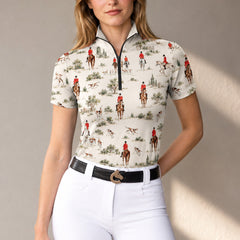 Off white foxhunting print riding top styled with white riding breeches and a black belt with bronze horse head buckle