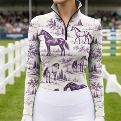Purple print riding top at a show jumping arena with obstacles