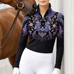 Close view of the standing collar and quarter zip front with purple printed sections and black trim