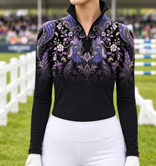 Close view of stacked diamond medallions and symmetrical floral paisley motifs below the center front zipper