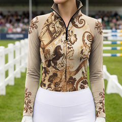 Close view of the black quarter zip placket and stand collar on the beige long sleeve riding top