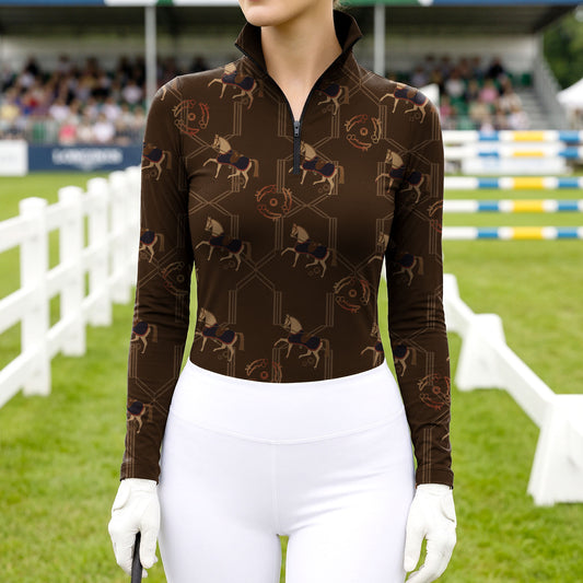 Woman wearing RIDER ATELIER heritage monogram horse espresso brown equestrian quarter-zip top at the show jumping arena