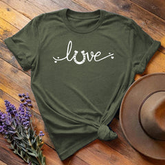 Olive green horse shoe love equestrian t-shirt with white script print, flat lay on wooden background