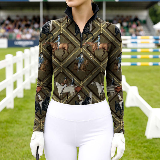 Woman wearing vintage equestrian scene quarter-zip top at show jumping arena