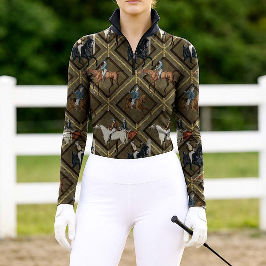 Woman wearing vintage equestrian scene quarter-zip top at farm fence