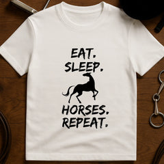 White equestrian "Eat Sleep Horses Repeat" print cotton t-shirt, front view casual horse tee