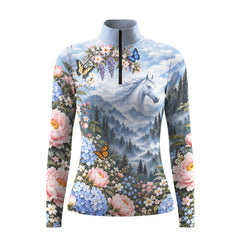 Long sleeve quarter zip riding top with a light blue stand up collar, black center front zipper, and full coverage print of a white horse, misty mountain forest, pink peonies, blue hydrangeas, and butterflies